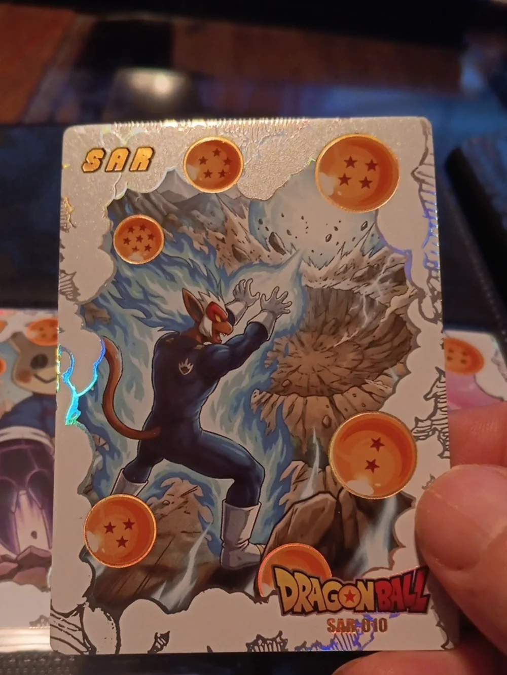 Pokemon Trading Card - Blue Character with Gold Dragon Orbs